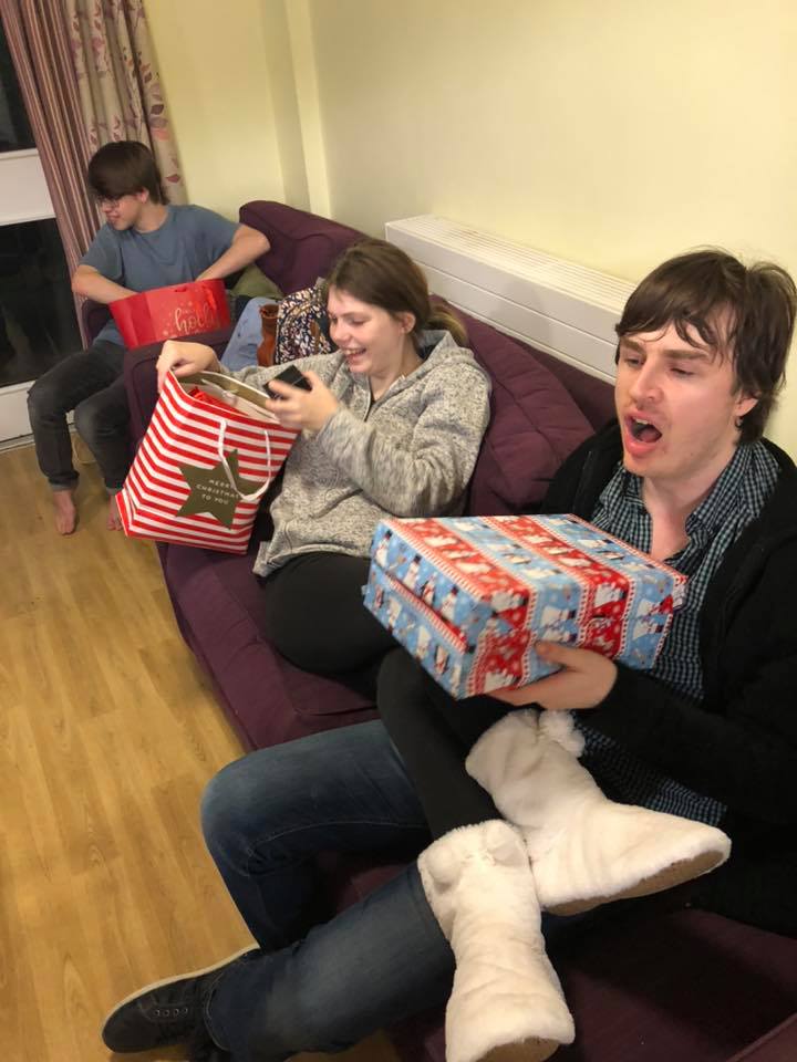 Residents receiving Christmas gift bag and boxes