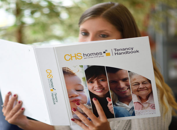 CHS tenant reading the tenancy handbook