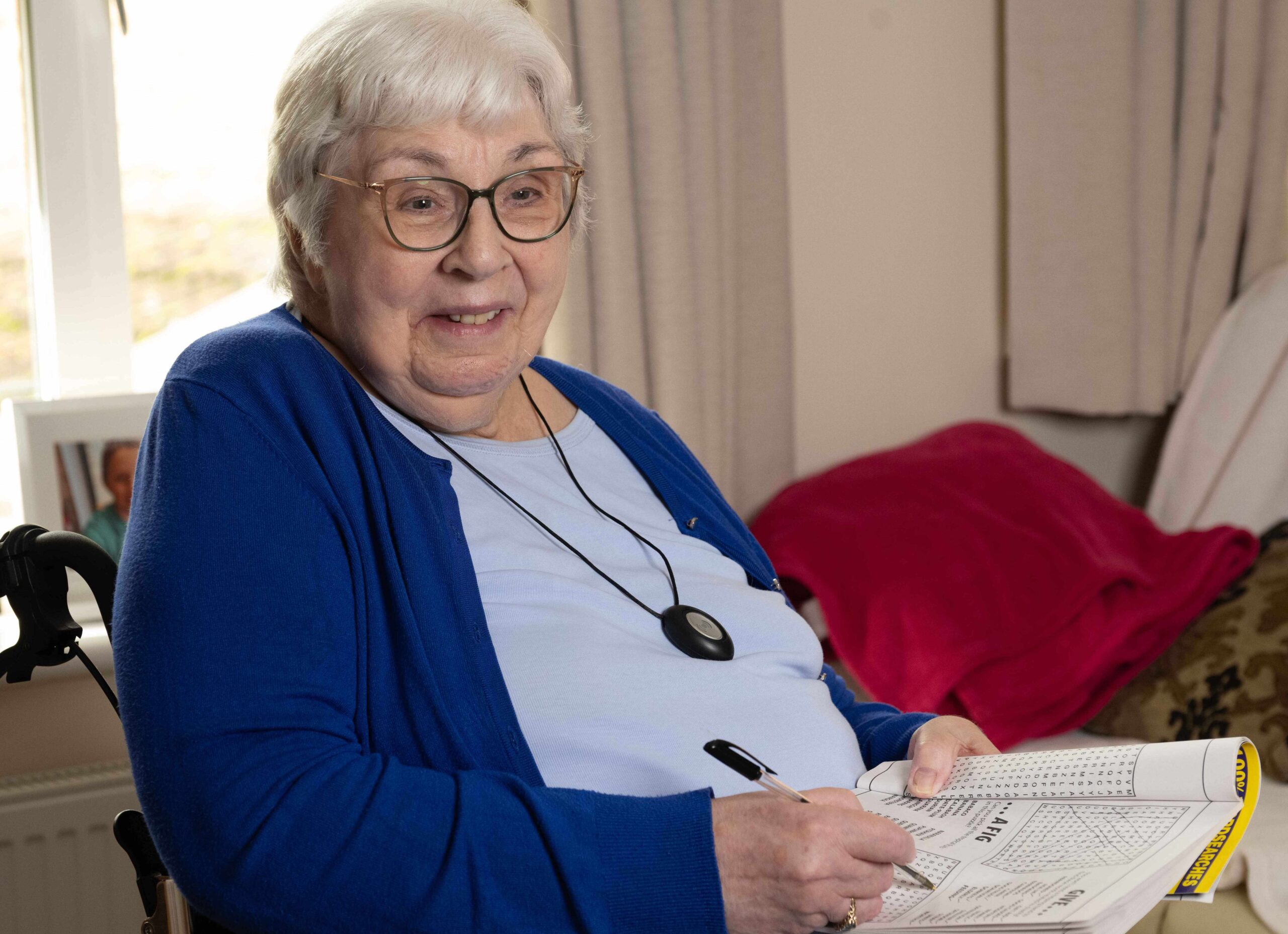White older female tenant sitting in a wheelchair