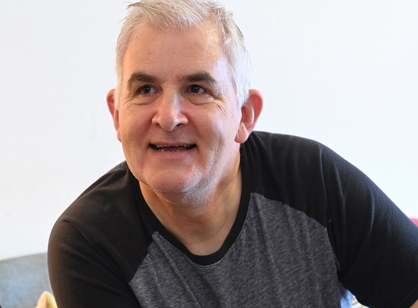 White male CHS tenant smiling