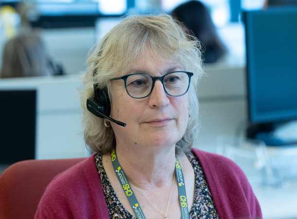 Smiling CHS customer service advisor